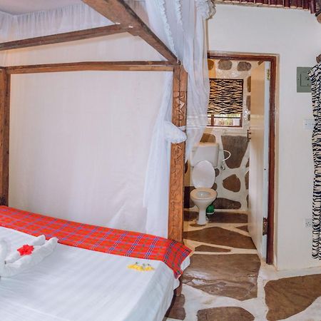 Kijani Cottages In Diani 迪亚尼海滩 外观 照片