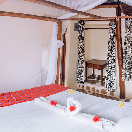 Kijani Cottages In Diani 迪亚尼海滩 外观 照片