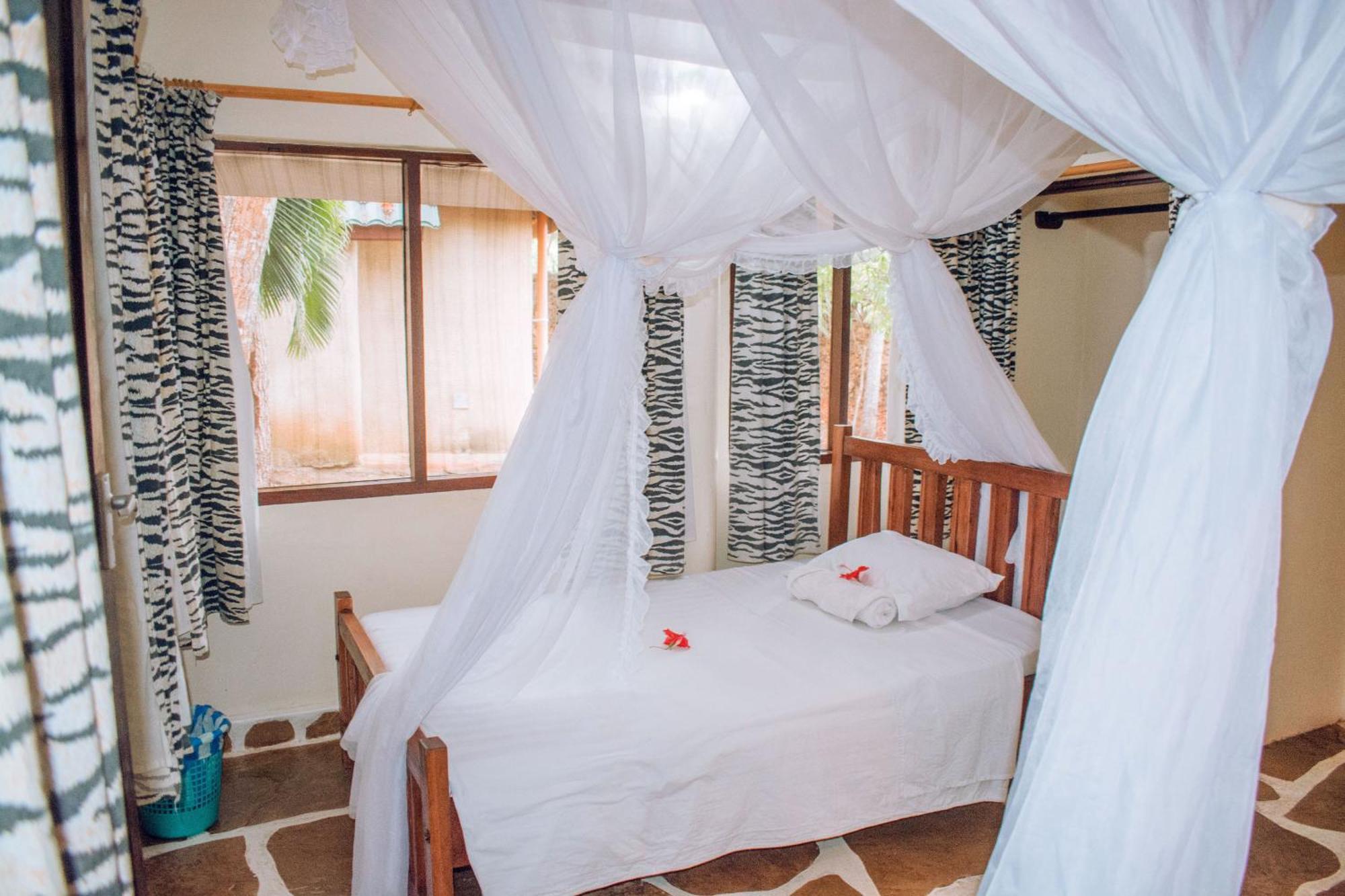 Kijani Cottages In Diani 迪亚尼海滩 外观 照片