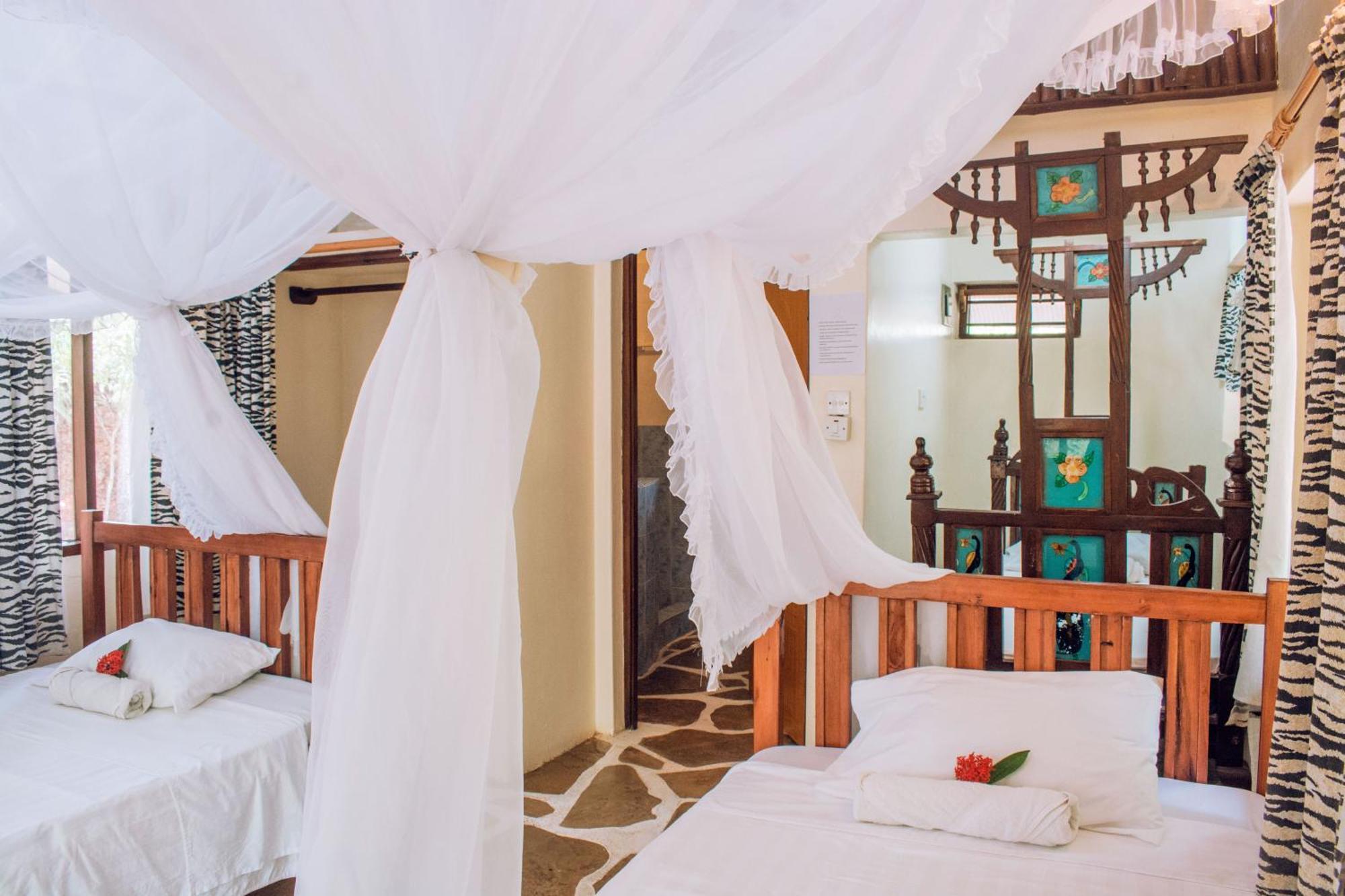 Kijani Cottages In Diani 迪亚尼海滩 外观 照片