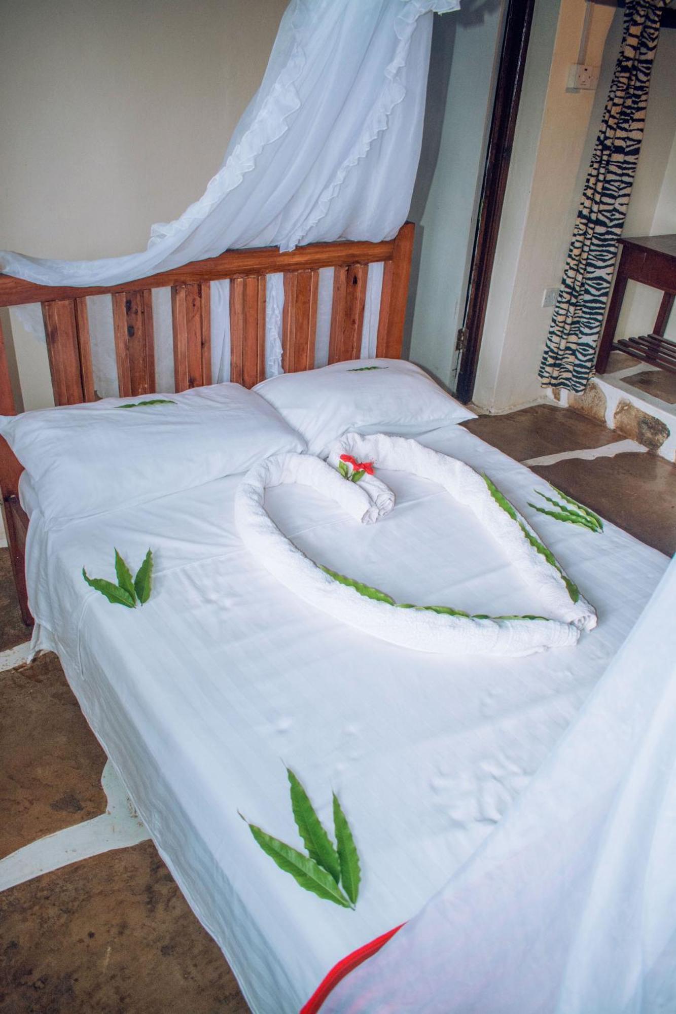 Kijani Cottages In Diani 迪亚尼海滩 外观 照片